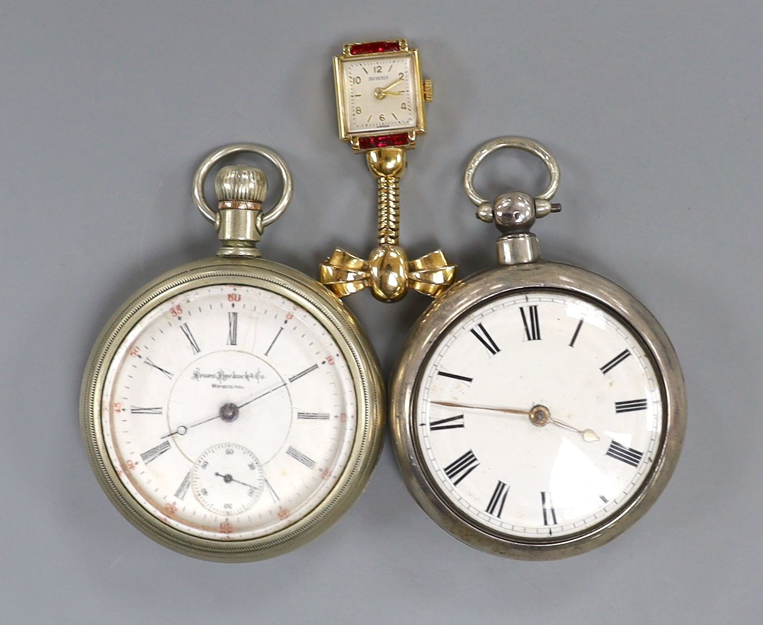A 19th century silver pair cased keywind pocket watch by Gardner, Dunbar, one other pocket watch and a Bucherer lapel watch.